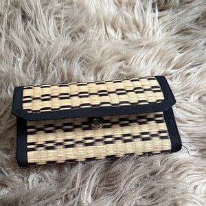 Elegant Black and Tan Woven Clutch